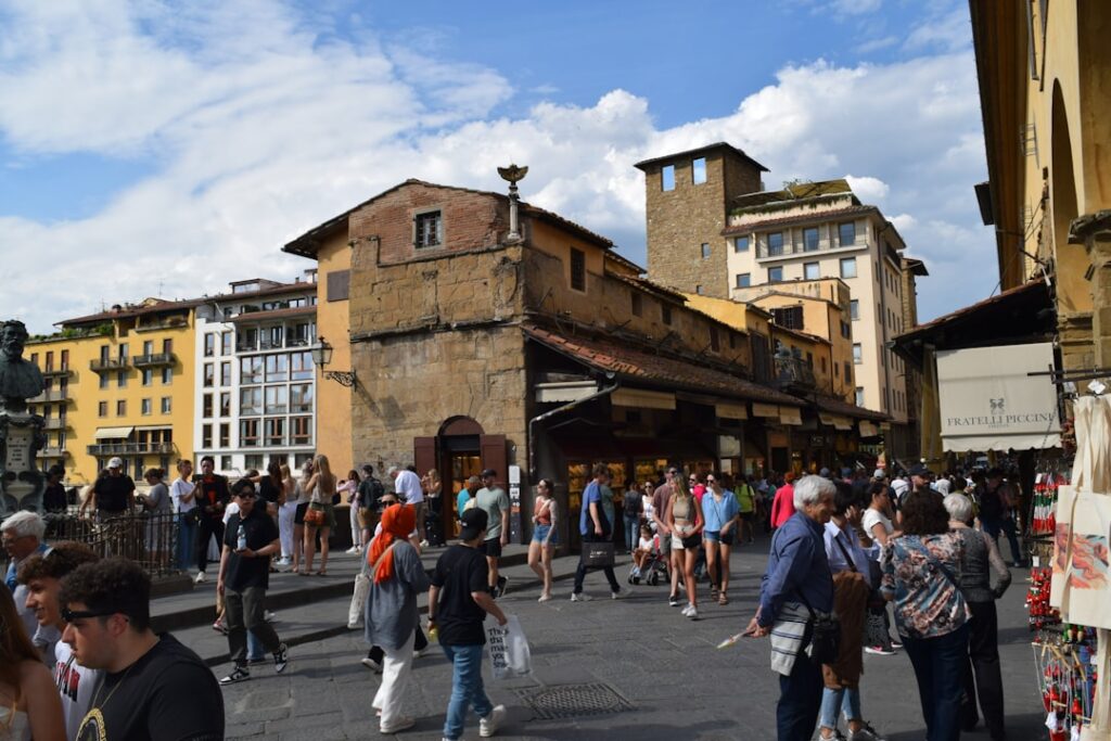 Tourist checking map Ponte Vecchio safety bag front