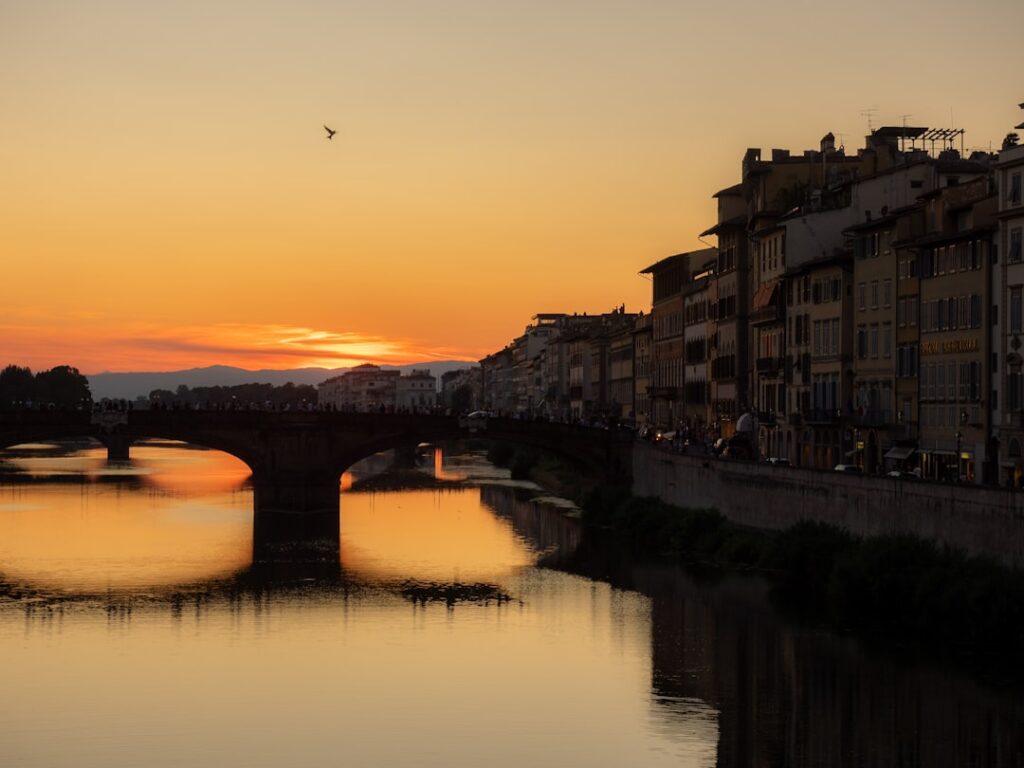 Florence Ponte Vecchio sunset couple silhouette