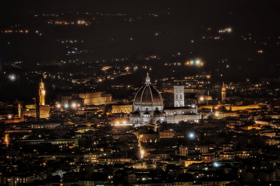 Night panorama of Florence with illuminated Duomo and scattered city lights