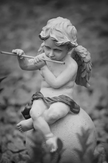Petit putto ailé jouant de la flûte, assis sur une sphère.
