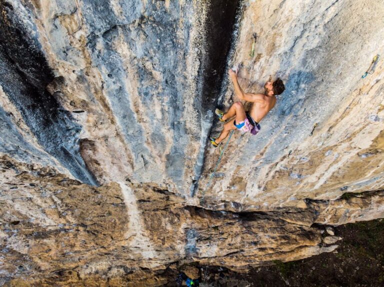 limestone cliff near florence with climbers